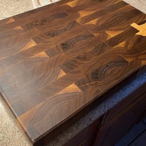 Walnut cutting board with cherry Texas inlay
